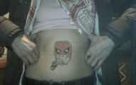 Funny Belly Button Tattoos 1 Desktop Background