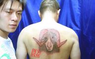 Funny Bad Tattoos 19 Background Wallpaper
