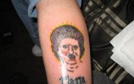 Funny Bad Tattoos 15 Background Wallpaper